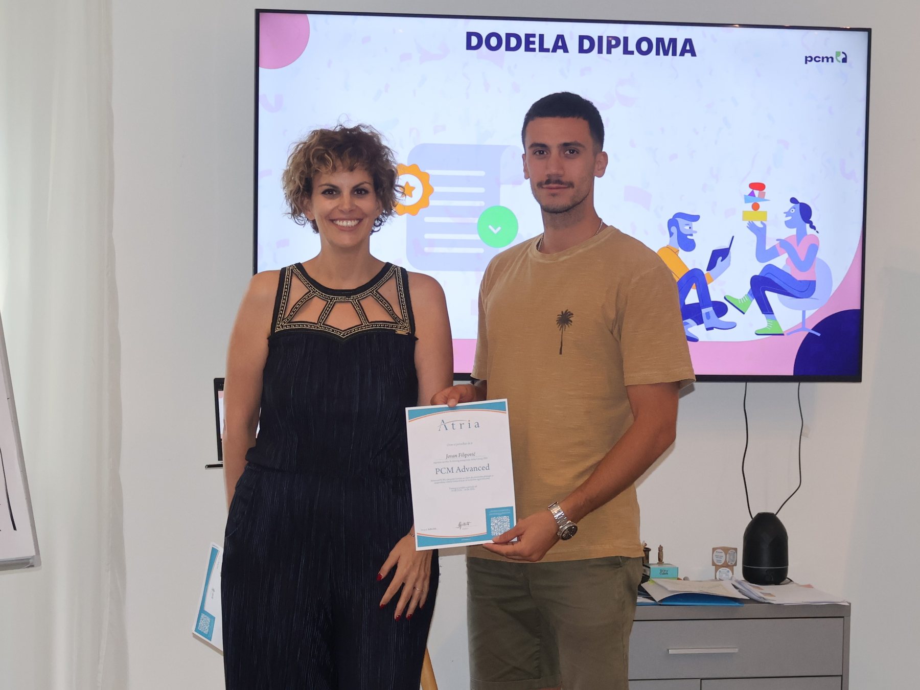 Jovan at an award or recognition event.